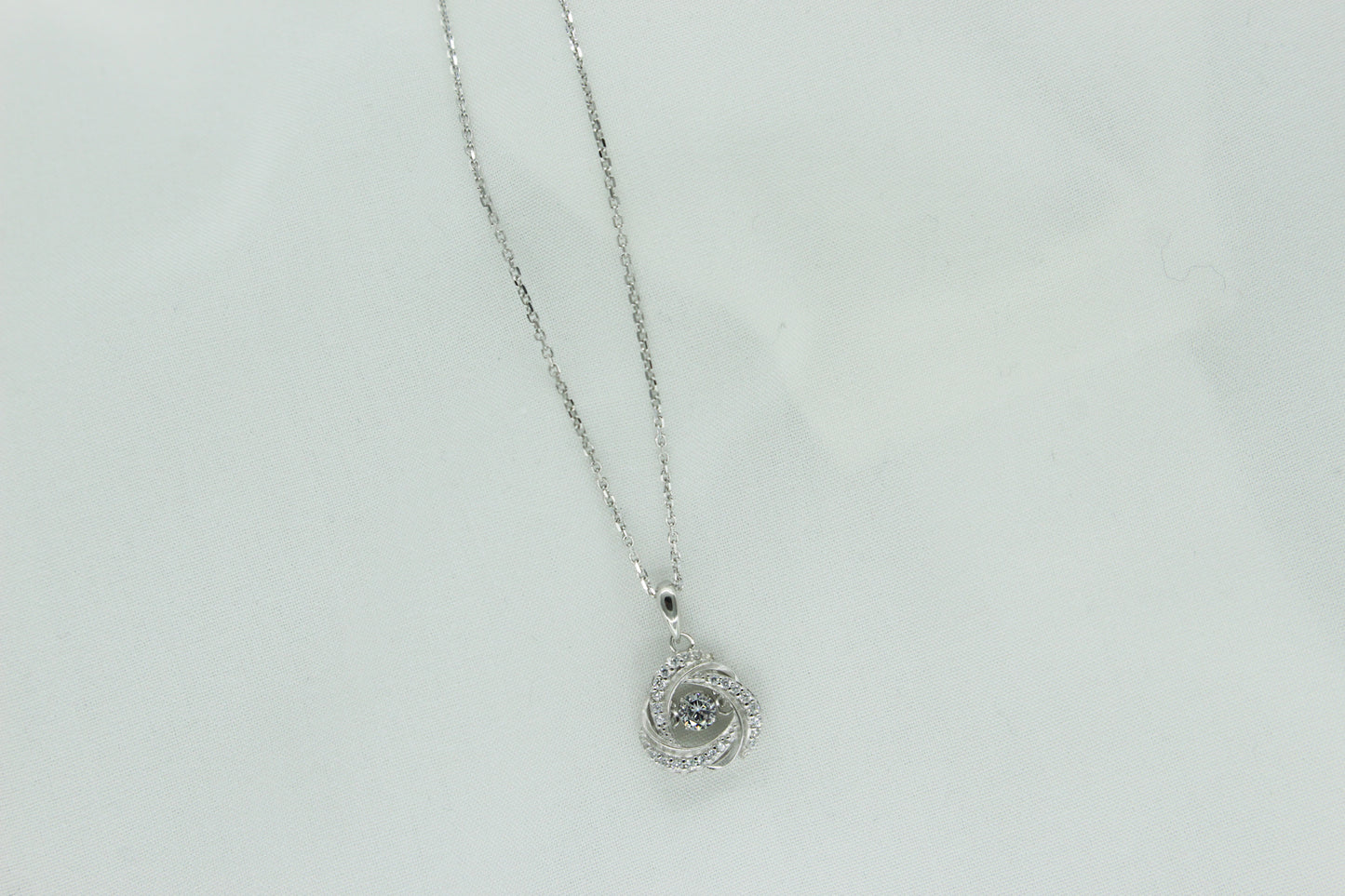Floating Crystal Love Knot Necklace in Sterling Silver