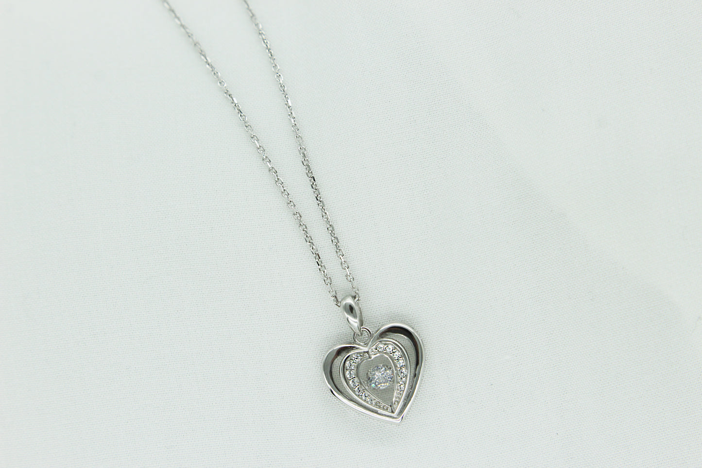 Floating Crystal Double Heart Necklace in Sterling Silver