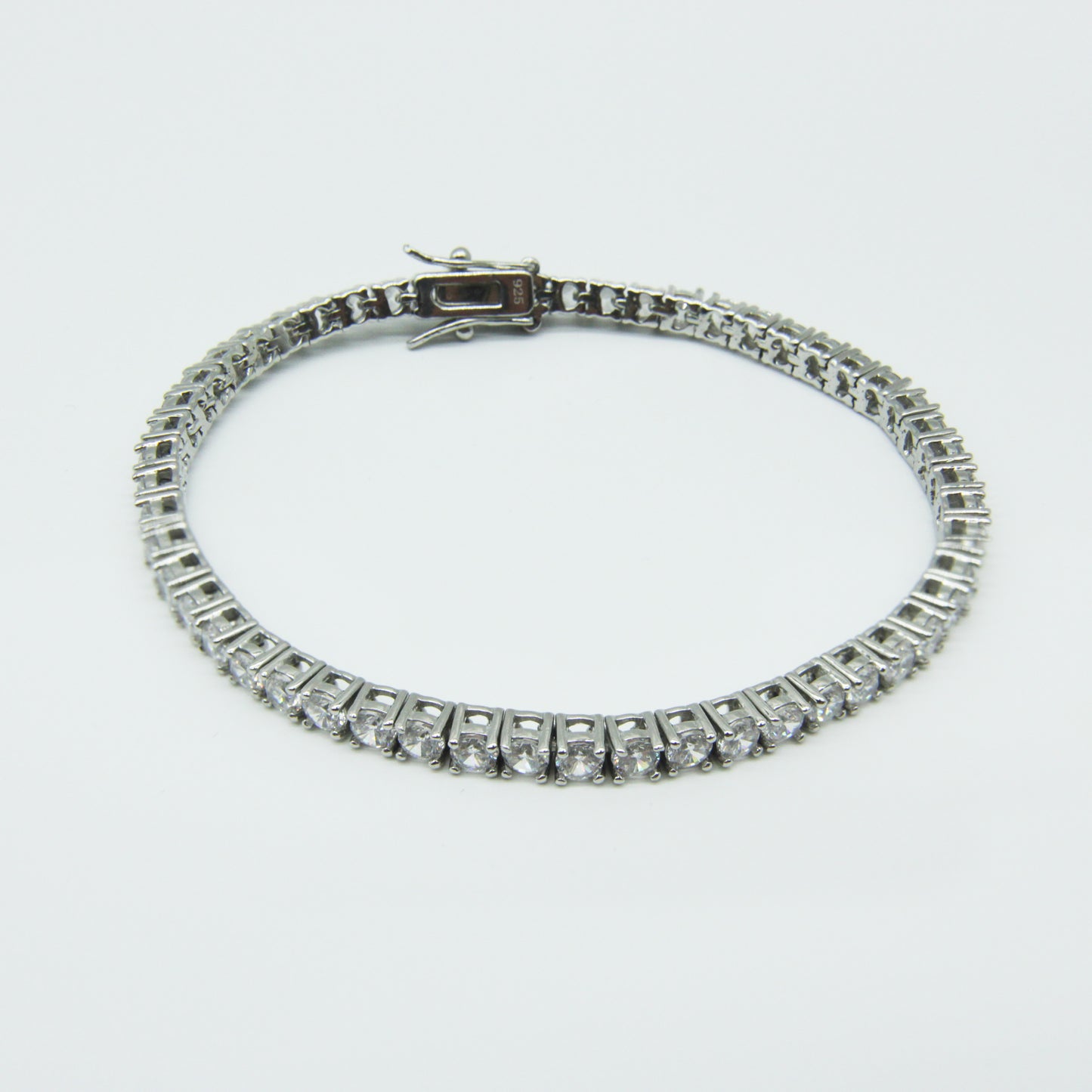 Round Iced Out Tennis Bracelet in Sterling Silver